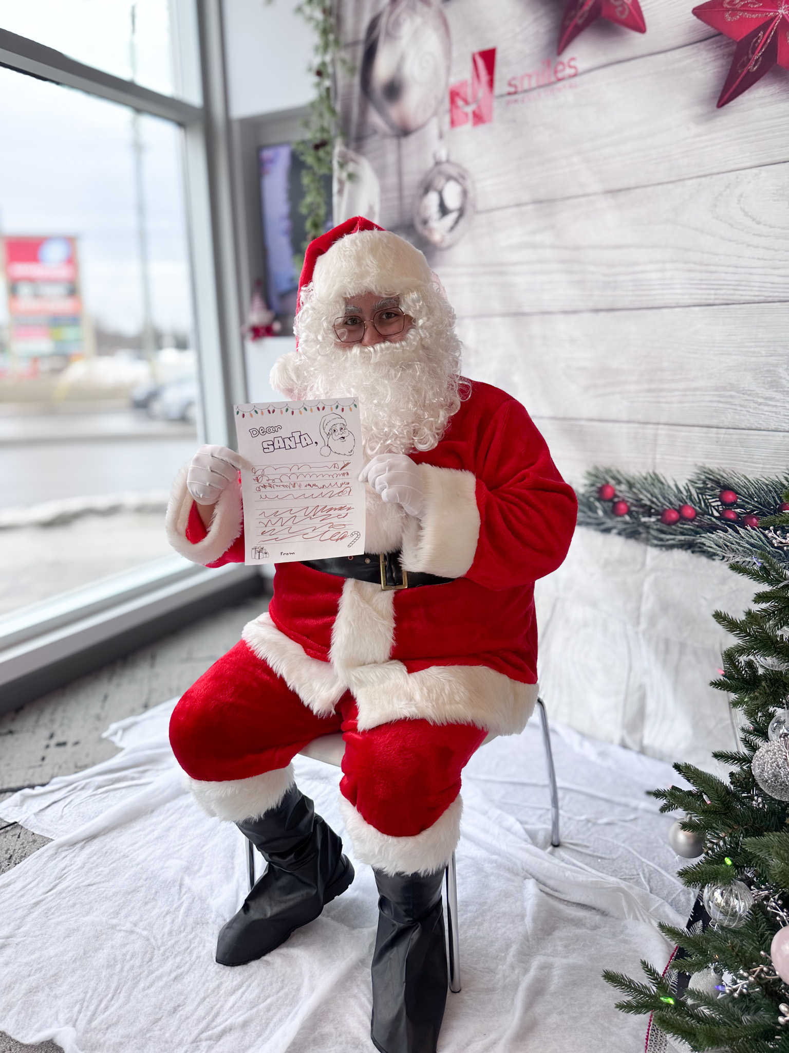 santa with christmas wishlist