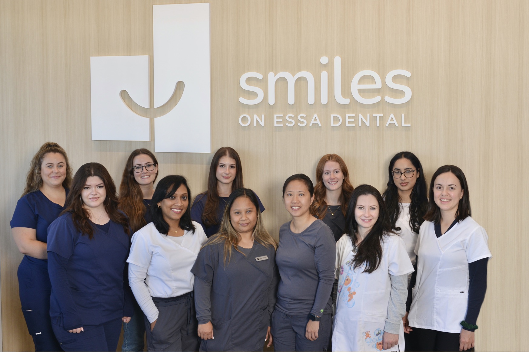 Smiles on Essa Dental group photo, trusted Barrie dentists